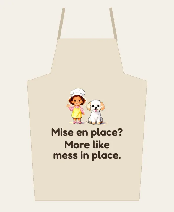 Apron that says "Mise en place? More like mess in place." with Chef May and Coco