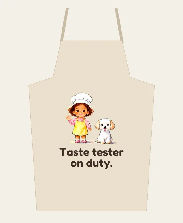 Apron that says "Taste tester on duty." with Chef May and Coco